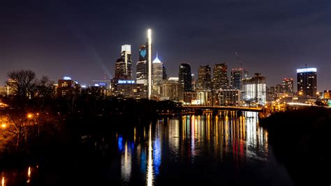 Philly Skyline Shines Blue For Covid 19 Anniversary Visit Philadelphia