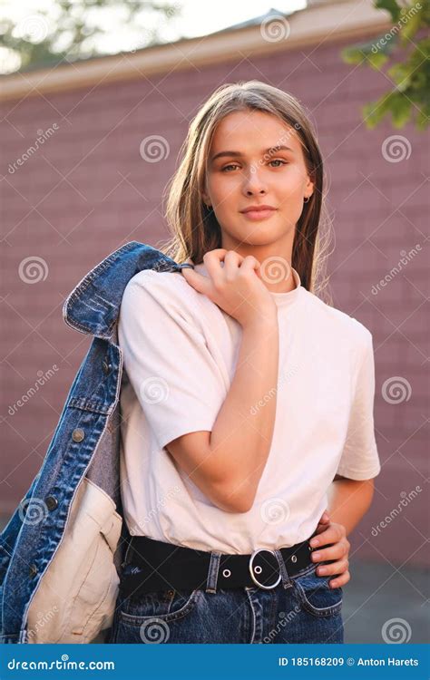 beautiful casual girl confidently looking in camera outdoor stock image image of modern