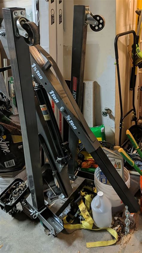 From the photo and previous experience with their tools, i'd be a little leery of the steel support foot (triangles at each end) cutting through the rubber/plastic foot and landing on the fender frame directly. Harbor Freight Engine Hoist 2 Ton : Harbor Freight engine hoist shop Crane 1-2 ton assembly ...