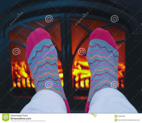 A Pair Of Feet And A Cozy Fire Stock Photo Image Of Cold Feet