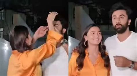 alia bhatt tries to fix ranbir kapoor s hair he pushes her hand away watch bollywood