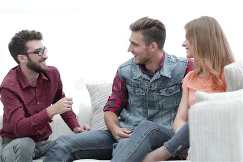 Group Of Young People Talking Sitting On The Couch Stock Image Image