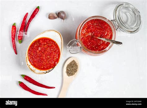 Hot Chili Pepper Sauce Paste Harissa Adjika On A White Background