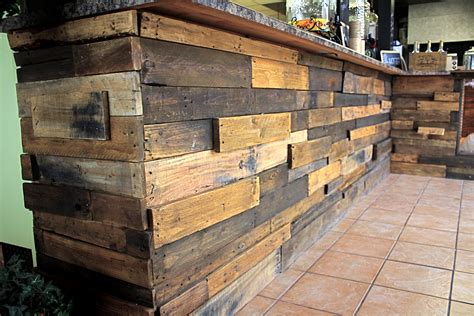 Pallet Wall The Use Of Reclaimed Wood From Shipping Pallets Sanded