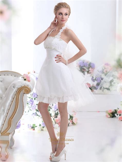 In preparation for the celebration must take into account every detail, so that nothing marred this joyful day. White Short Halter Neck Wedding Dresses With Pearls And ...