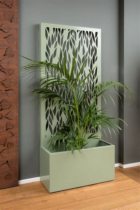 A Freestanding Screen Offering Privacy And A Generous Planter For Your