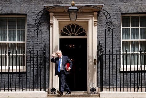 Boris Johnson Defies Calls To Resign Amid Mass Exodus The Washington Post