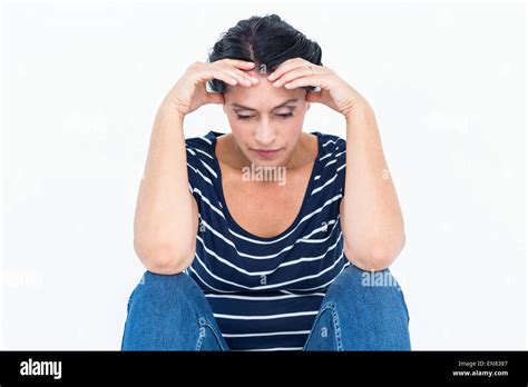 Sad Woman Sitting With Head In Hands Stock Photo Alamy