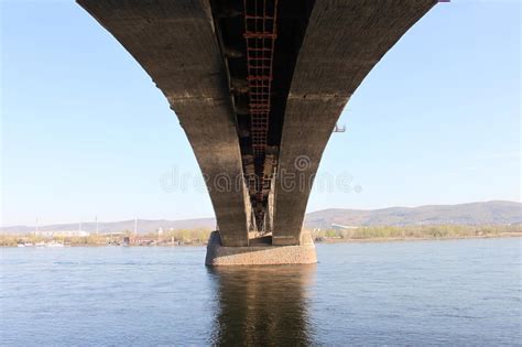 A Bottom View Of The Communal Bridge Across Yenisey River On A Hot