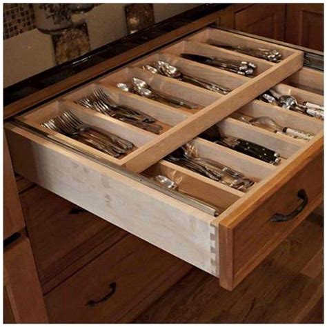 This drawer features tiered shelving so that all of your spices are easily accessible when you need them. 31 Must Have Accessories for Kitchen Cabinet Storage (With ...