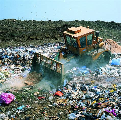 Bulldozer Working On Landfill Siteuk ストックフォト Getty Images