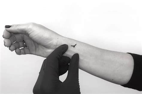 Why do you have a bird tattoo on your wrist? Tiny flying bird tattoo on the wrist. (With images) | Bird ...