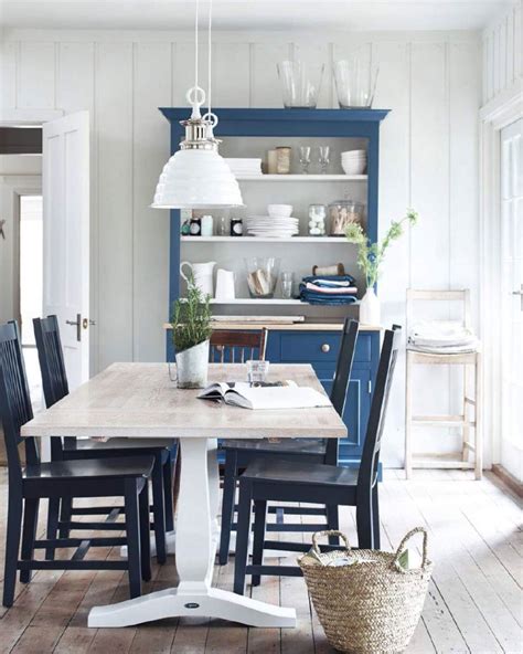 When you think of dining rooms, various styles and colors come to mind, and here we are going to show you how the blue color works in the dining space. White and Blue Country Dining Room - Interiors By Color