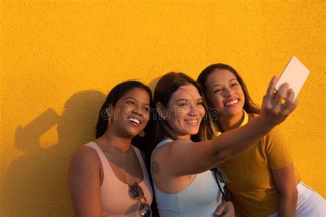 Three Girls In The Park Posing And Taking Selfies Stock Image Image Of Femininity Beauty