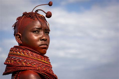 turkana tribe woman with huge necklaces and ear rings turkana lake loiyangalani kenya