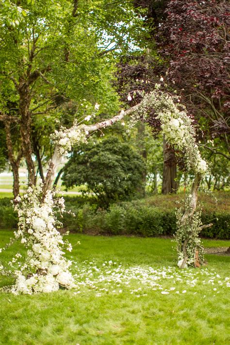 Whimsical Flower Arch With White Flowers