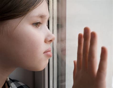 Girl Is Looking Through Window Sad Concept Stock Image Image Of