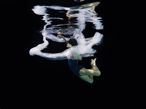 Ballerina Falling Through Fabric By Thomas Barwick