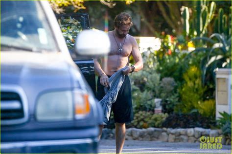 gerard butler strips off his shirt after surfing session photo 4349065 gerard butler