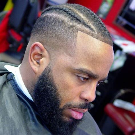 Edgy and short haircut for black men. Fade Haircut for Black Men, High and Low Afro Fade Haircut ...