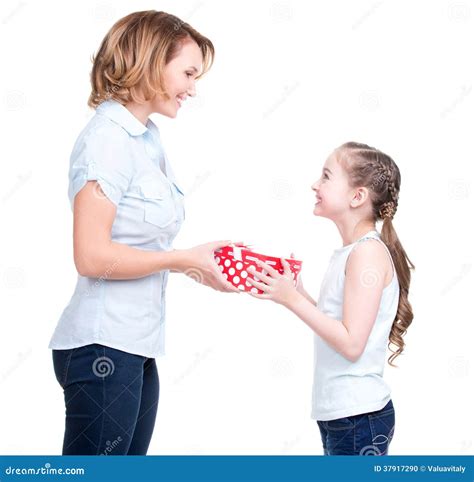 Mother Gives A T To Her Young Daughter Stock Photo Image Of
