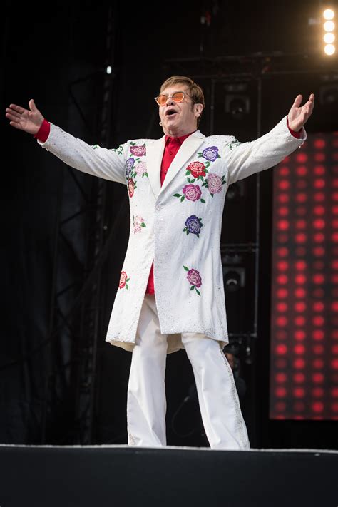 Elton john performs at dodger stadium in los angeles, 1975. Elton John: 16 Wild Outfits