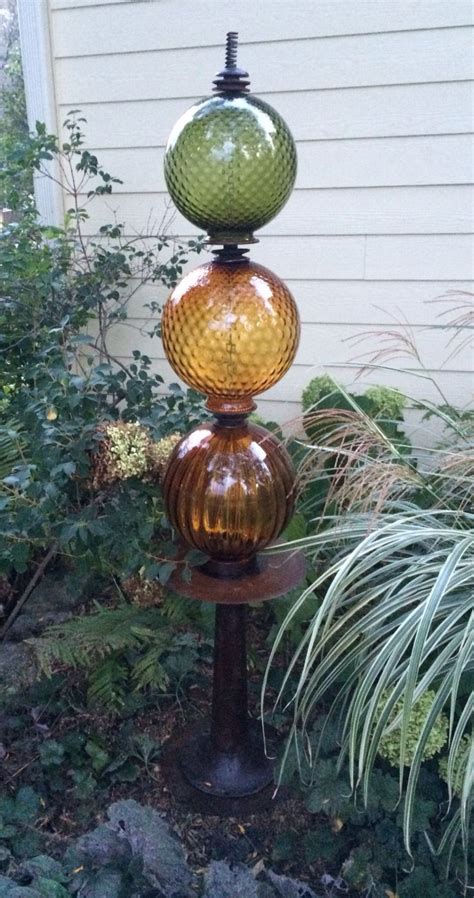 Repurposed Garden Art Created Using Vintage Lamps Discarded Metal And