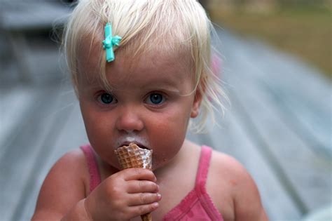 First Cone Minna Enjoying Her First Ice Cream Cone She Wa Flickr