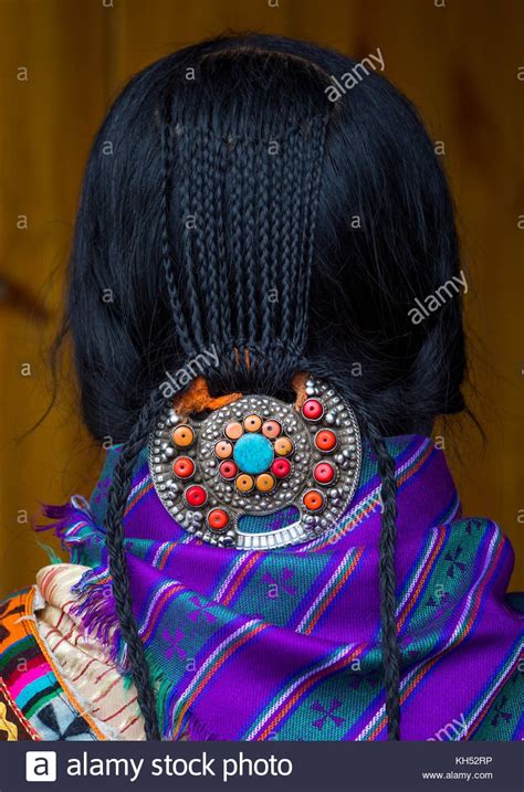 Nyingma Tibetan Nomad Wearing A Silver And Coral Plaque In Her Braided