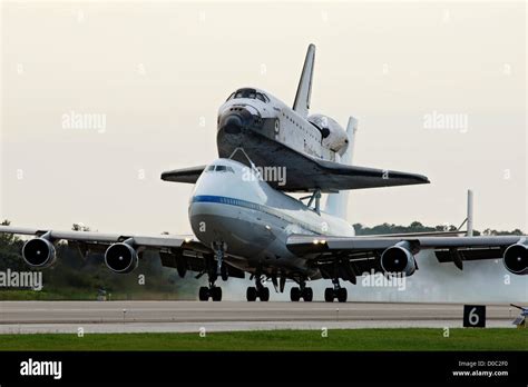 The 747 Shuttle Carrier Aircraft Atlantis On Top Returns Kennedy Space