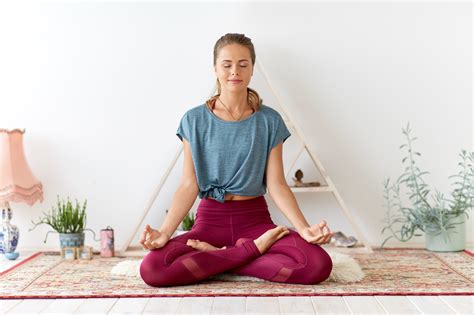 Woman Meditating In Lotus Pose At Yoga Studio Ralph Smart Infinite Waters Diving Deep