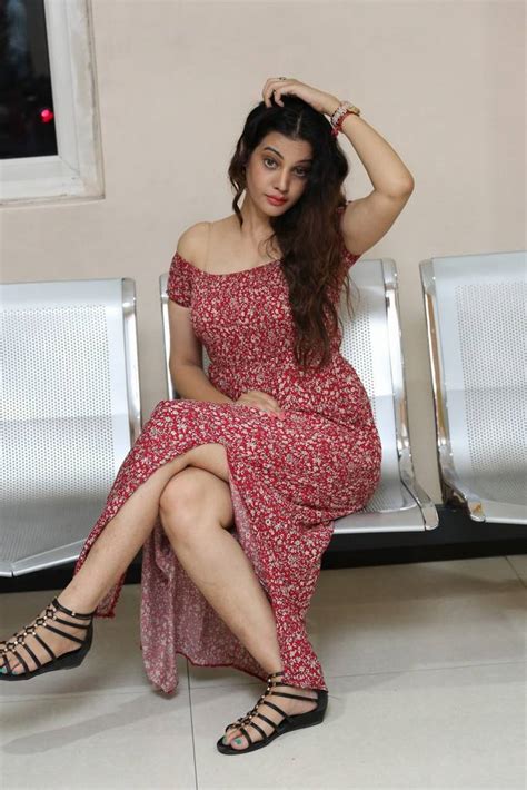 beautiful indian queen diksha panth stills in red dress at pre release event indian stars