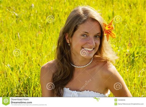 sweet brunette girl over grass stock image image of rest person 18480635