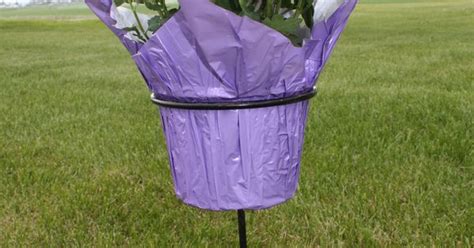 Rod Iron Flower Pot Holder Keeps Plant In Place At The Graveside Or
