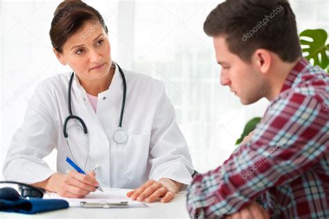 Doctor Talking To Patient Stock Photo By ©alexraths 20134333