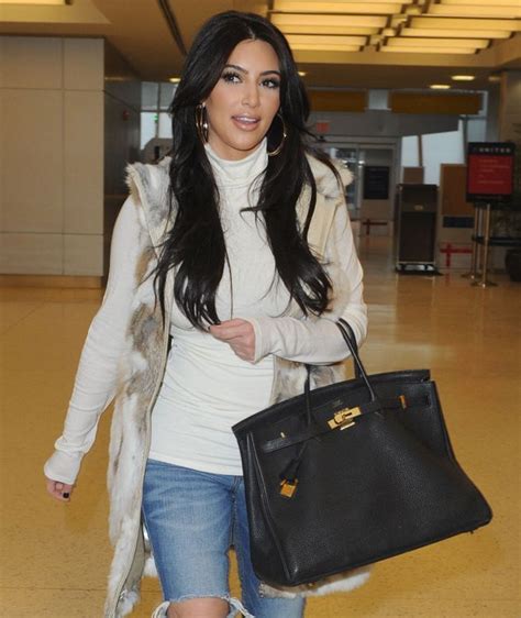 the many many bags of kim kardashian purseblog kim kardashian with hermes birkin bags