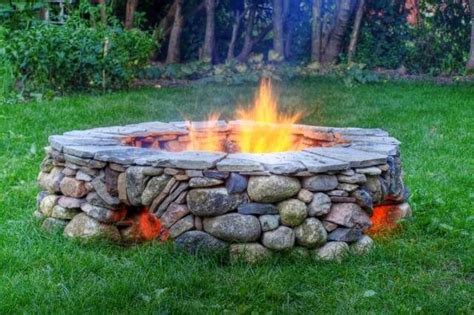 If that's enough for you, what are you doing still reading? River Rock Fire Pit | My Big yard ideas | Pinterest