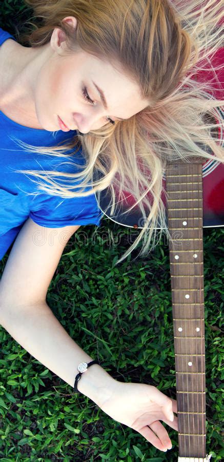 Portrait Of A Teenager With A Guitar In The Park Stock Photo Image Of