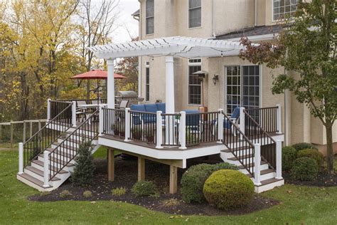 What are the shipping options for vinyl deck railings? Vinyl Deck with Pergola in Lansdale, PA - Stump's Decks