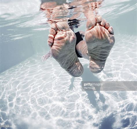 Mature Womans Feet In Pool Closeup Photo Getty Images