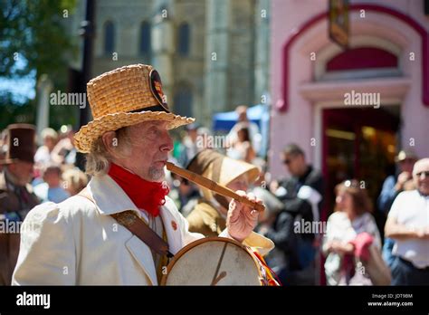 Man In A Wicker Top Hat Blowing A Whistle On The Parade At The Stock Photo Alamy