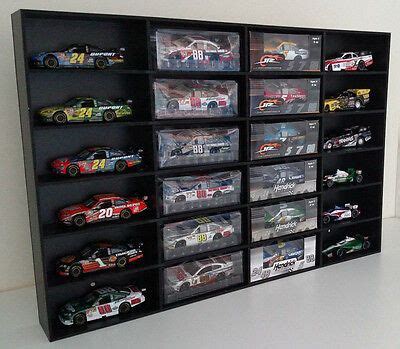 Overall outside dimensions are 23 7/8 h x 28 5/8 w x 3 7/8 d. 1:64 Diecast Car Wall Display Case holds 24 Cars Lionel ...