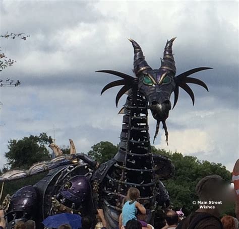 maleficent dragon float catches fire during festival of fantasy parade