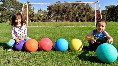 Toddlers Learn Colors Playing Kickball With Colored Playground Balls