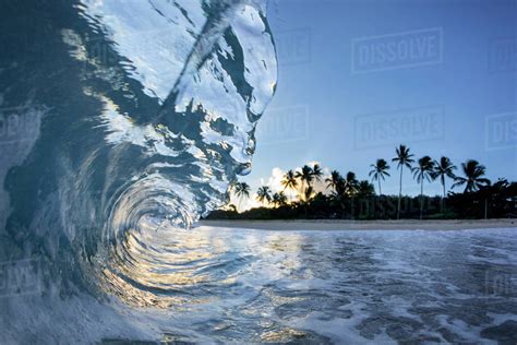 Wave Breaking Near Shore Of Ke Iki Beach At Sunset North Shore Of Oahu