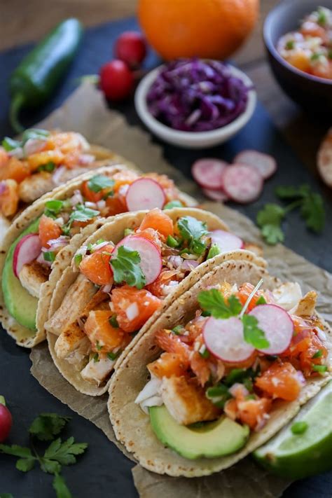 This kind of fish taco is either grilled or fried and topped. Fish Tacos with Orange Salsa - The Roasted Root