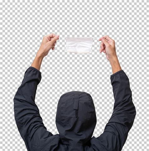 Premium Psd Man Holding Face Mask Over His Head