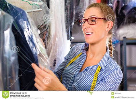 Cleaner In Laundry Shop Checking Clean Clothes Stock Photo Image Of