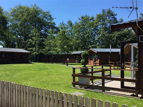 Log Cabins With Hot Tubs In North Wales Llannerch Holiday Park The Fallows Log Cabin