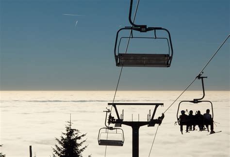 Skiers On A Chairlift Copyright Free Photo By M Vorel Libreshot